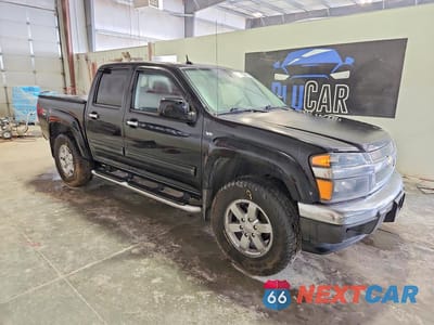 Czwarte zdjęcie samochodu z boku: 2011 CHEVROLET COLORADO LT VIN:1GCHTDFP9B8114959 - miniatura
