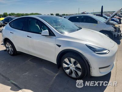 Czwarte zdjęcie samochodu z boku: 2023 TESLA MODEL Y VIN:7SAYGDEE8PA095431 - miniatura