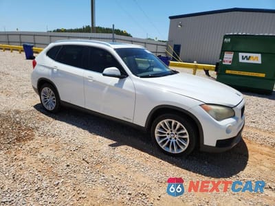 Czwarte zdjęcie samochodu z boku: 2013 BMW X1 XDRIVE28I VIN:WBAVL1C50DVR87764 - miniatura