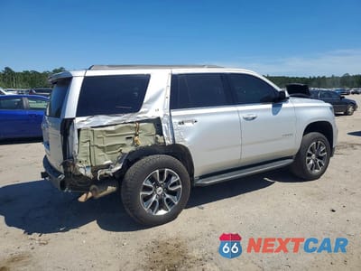 Trzecie zdjęcie samochodu z tyłu: 2020 CHEVROLET TAHOE K1500 LT VIN:1GNSKBKC7LR203772 - miniatura