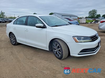 Czwarte zdjęcie samochodu z boku: 2017 VOLKSWAGEN JETTA VIN:3VWDB7AJXHM262738 - miniatura