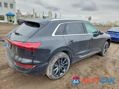 Trzecie zdjęcie samochodu z tyłu: 2024 AUDI Q8 E-TRON PREMIUM VIN:WA14ABGE4RB019884 - miniatura