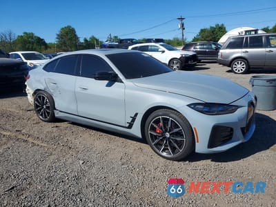 Czwarte zdjęcie samochodu z boku: 2023 BMW I4 M50 VIN:WBY33AW09PFP11834 - miniatura