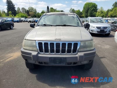 Piąte zdjęcie samochodu w środku: 2003 JEEP GRAND CHEROKEE LAREDO VIN:1J4GW48N53C554507 - miniatura