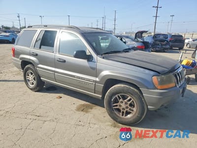 Czwarte zdjęcie samochodu z boku: 2002 JEEP GRAND CHEROKEE LAREDO VIN:1J4GX48S32C146122 - miniatura