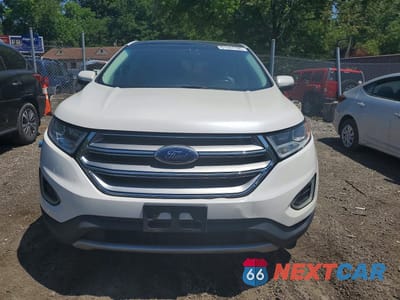 Piąte zdjęcie samochodu w środku: 2015 FORD EDGE TITANIUM VIN:2FMTK4K92FBB40614 - miniatura