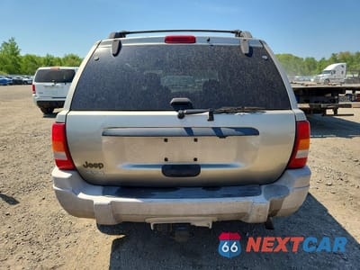 Zdjęcie 6 z 13 samochodu: 2004 JEEP GRAND CHEROKEE LAREDO VIN:1J4GW48S94C310642 - miniatura