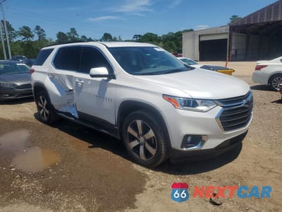 Czwarte zdjęcie samochodu z boku: 2019 CHEVROLET TRAVERSE LT VIN:1GNERHKW3KJ130919 - miniatura