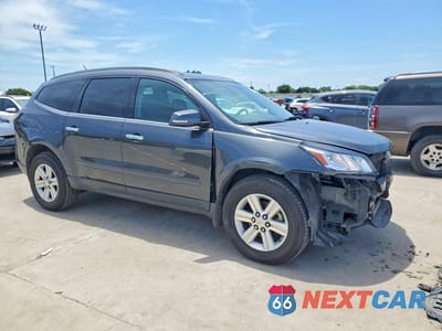 Czwarte zdjęcie samochodu z boku: 2014 CHEVROLET TRAVERSE LT VIN:1GNKRHKD9EJ307348 - miniatura