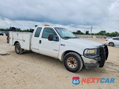 Czwarte zdjęcie samochodu z boku: 2001 FORD F250 SUPER - DELIVERY TRUCK VIN:1FTNX20F91EB36469 - miniatura