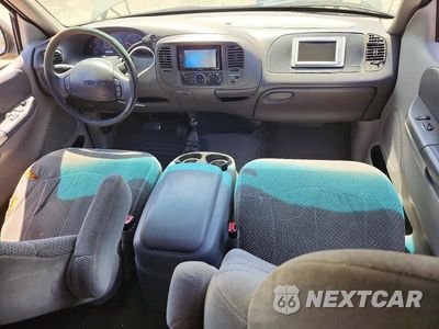 Zdjęcie 8 z 12 samochodu: 1999 FORD F-150 VIN:1FTRX18W3XKA56188 - miniatura