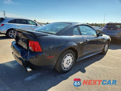 Trzecie zdjęcie samochodu z tyłu: 1999 FORD MUSTANG VIN:1FAFP4040XF145388 - miniatura