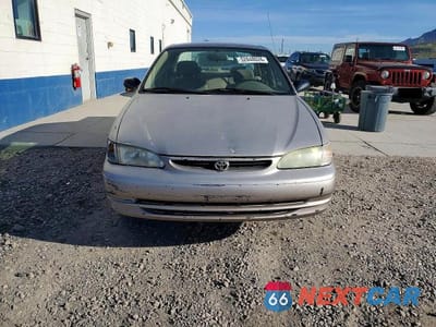 Piąte zdjęcie samochodu w środku: 1999 TOYOTA COROLLA VE VIN:1NXBR12E6XZ242979 - miniatura