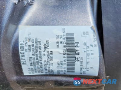 Zdjęcie 12 z 12 samochodu: 2007 FORD FOCUS ZX3 VIN:1FAFP31N17W112448 - miniatura