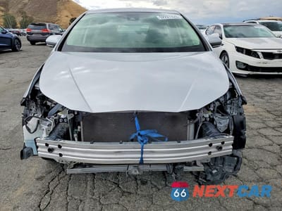 Piąte zdjęcie samochodu w środku: 2022 TOYOTA PRIUS L ECO VIN:JTDKAMFU5N3160842 - miniatura