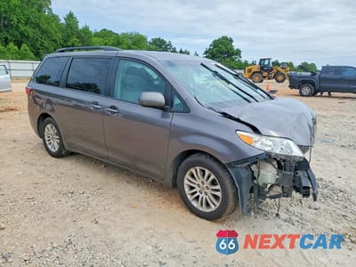 Czwarte zdjęcie samochodu z boku: 2016 TOYOTA SIENNA XLE PREMIUM 8-PASSENGER VIN:5TDYK3DC3GS713243 - miniatura