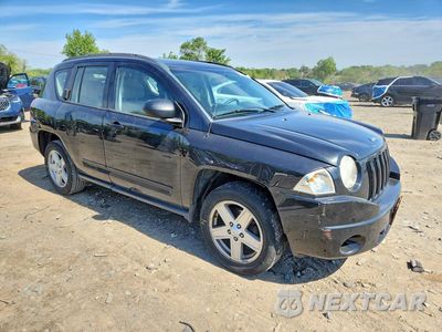 Czwarte zdjęcie samochodu z boku: 2010 JEEP COMPASS VIN:1J4NT4FB7AD672929 - miniatura