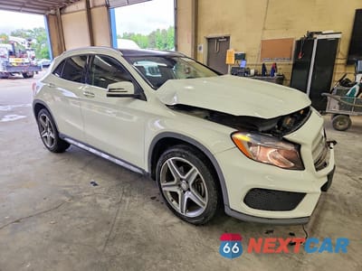 Czwarte zdjęcie samochodu z boku: 2015 MERCEDES-BENZ GLA 250 4MATIC VIN:WDCTG4GB4FJ088202 - miniatura