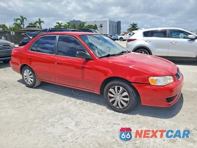 Czwarte zdjęcie samochodu z boku: 2001 TOYOTA COROLLA LE VIN:2T1BR12E01C427716 - miniatura