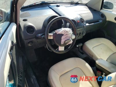 Zdjęcie 8 z 13 samochodu: 2007 VOLKSWAGEN NEW BEETLE TRIPLE WHITE VIN:3VWFF31YX7M419511 - miniatura