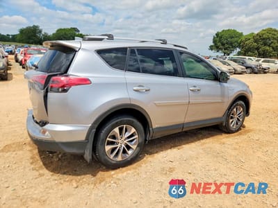 Trzecie zdjęcie samochodu z tyłu: 2018 TOYOTA RAV4 HYBRID LE VIN:JTMRJREV0JD178319 - miniatura