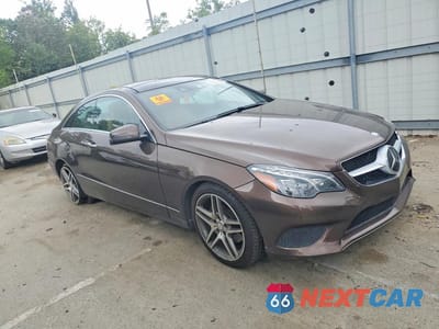 Czwarte zdjęcie samochodu z boku: 2015 MERCEDES-BENZ E 400 VIN:WDDKJ6FB3FF304789 - miniatura