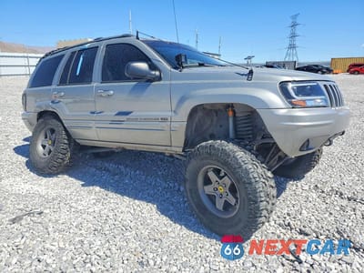 Czwarte zdjęcie samochodu z boku: 2000 JEEP GRAND CHEROKEE LIMITED VIN:1J4GW58N0YC359038 - miniatura