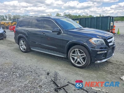Czwarte zdjęcie samochodu z boku: 2016 MERCEDES-BENZ GL 550 4MATIC VIN:4JGDF7DE3GA704160 - miniatura