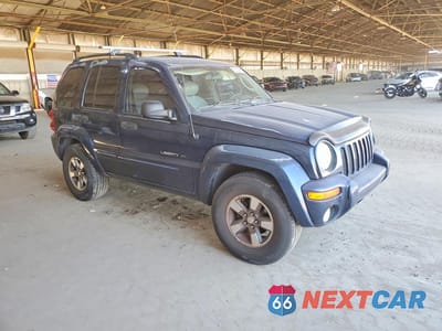 Czwarte zdjęcie samochodu z boku: 2002 JEEP LIBERTY LIMITED VIN:1J4GL58K82W270919 - miniatura