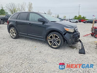 Czwarte zdjęcie samochodu z boku: 2011 FORD EDGE VIN:2FMDK4AK3BBA10361 - miniatura