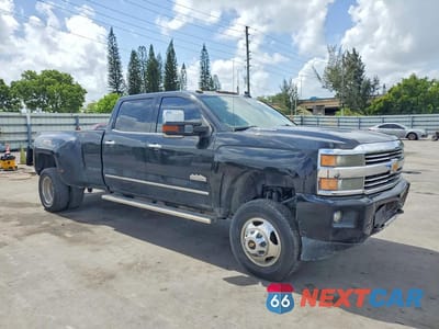 Czwarte zdjęcie samochodu z boku: 2015 CHEVROLET SILVERADO K3500 HIGH COUNTRY VIN:1GC4K1E86FF544671 - miniatura
