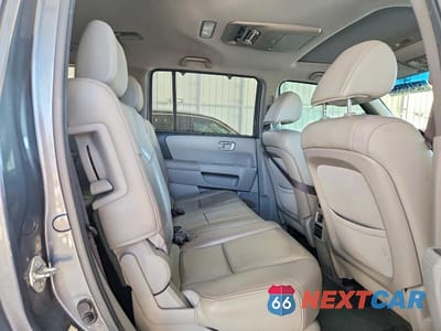 Zdjęcie 11 z 13 samochodu: 2013 HONDA PILOT TOURING VIN:5FNYF3H94DB034634 - miniatura