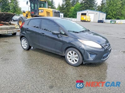 Czwarte zdjęcie samochodu z boku: 2011 FORD FIESTA SE VIN:3FADP4EJ2BM186006 - miniatura
