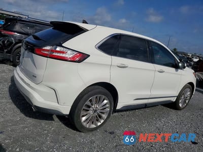 Trzecie zdjęcie samochodu z tyłu: 2022 FORD EDGE TITANIUM VIN:2FMPK4K93NBA29909 - miniatura