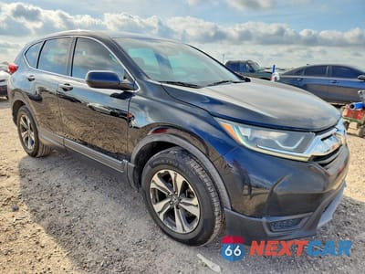 Czwarte zdjęcie samochodu z boku: 2018 HONDA CR-V LX VIN:2HKRW5H31JH412630 - miniatura