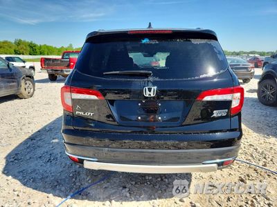 Zdjęcie 6 z 13 samochodu: 2019 HONDA PILOT TOURING VIN:5FNYF6H97KB047604 - miniatura