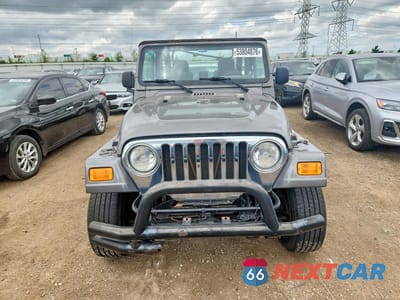 Piąte zdjęcie samochodu w środku: 2004 JEEP WRANGLER VIN:1J4FA39S44P770223 - miniatura