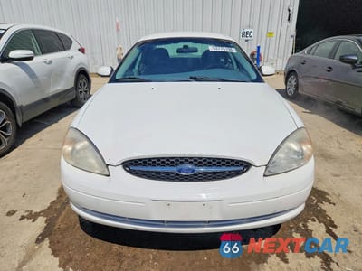 Piąte zdjęcie samochodu w środku: 2000 FORD TAURUS SES VIN:1FAFP5528YG140741 - miniatura