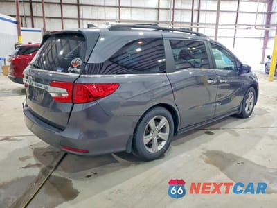 Trzecie zdjęcie samochodu z tyłu: 2018 HONDA ODYSSEY EXL VIN:5FNRL6H76JB093970 - miniatura