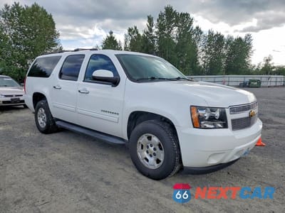Czwarte zdjęcie samochodu z boku: 2012 CHEVROLET SUBURBAN K1500 LT VIN:1GNSKJE73CR295584 - miniatura