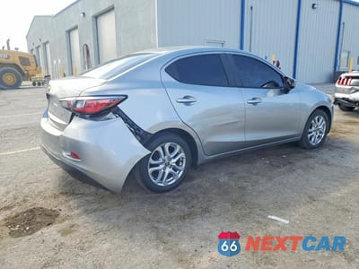 Trzecie zdjęcie samochodu z tyłu: 2016 SCION IA BASE VIN:3MYDLBZV4GY128391 - miniatura