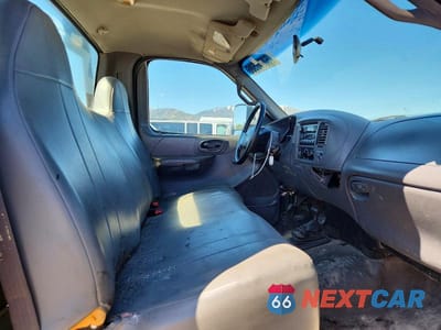 Zdjęcie 10 z 13 samochodu: 2001 FORD F150 VIN:1FTZF18271KF02379 - miniatura
