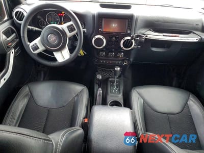 Zdjęcie 8 z 12 samochodu: 2015 JEEP WRANGLER UNLIMITED SAHARA VIN:1C4HJWEG5FL614235 - miniatura