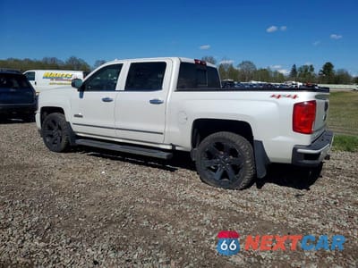 Drugie zdjęcie samochodu z przodu: 2017 CHEVROLET SILVERADO K1500 HIGH COUNTRY VIN:3GCUKTEJXHG204973 - miniatura