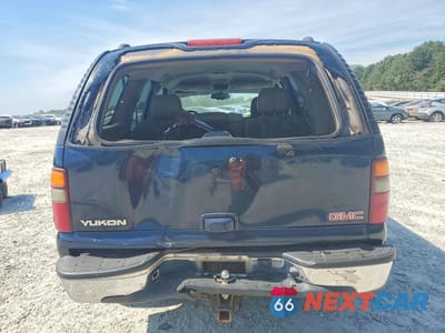 Zdjęcie 6 z 12 samochodu: 2004 GMC YUKON VIN:1GKEC13V34J116565 - miniatura