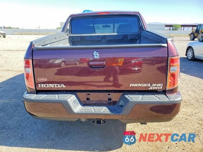 Zdjęcie 6 z 12 samochodu: 2011 HONDA RIDGELINE RTS VIN:5FPYK1F41BB010965 - miniatura