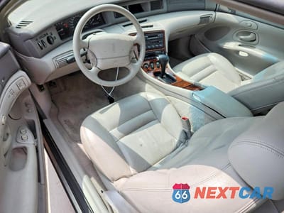 Zdjęcie 8 z 12 samochodu: 1995 LINCOLN MARK VIII BASE VIN:1LNLM91V2SY644728 - miniatura