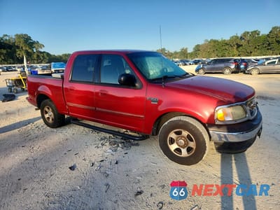 Czwarte zdjęcie samochodu z boku: 2003 FORD F150 SUPERCREW VIN:1FTRW07663KD83077 - miniatura