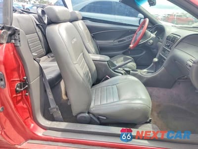 Zdjęcie 7 z 12 samochodu: 1999 FORD MUSTANG GT VIN:1FAFP45X6XF108400 - miniatura
