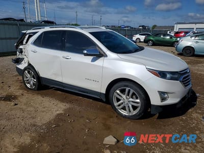 Czwarte zdjęcie samochodu z boku: 2018 CHEVROLET EQUINOX PREMIER VIN:2GNAXVEVXJ6339804 - miniatura